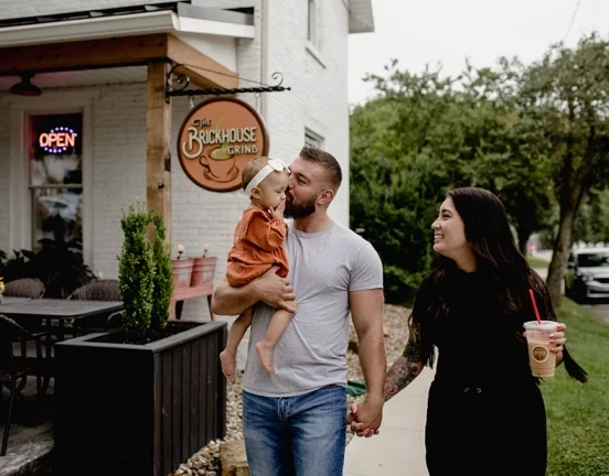 Family enjoying The Brickhouse Grind coffee shop