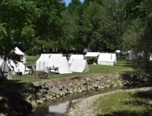 Photo of Colonial Trade Fair Tents at Wolf Creek Mill.