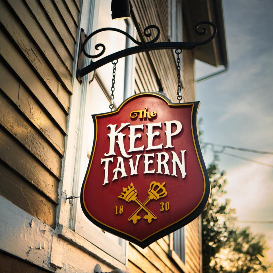 The Keep Tavern logo sign.